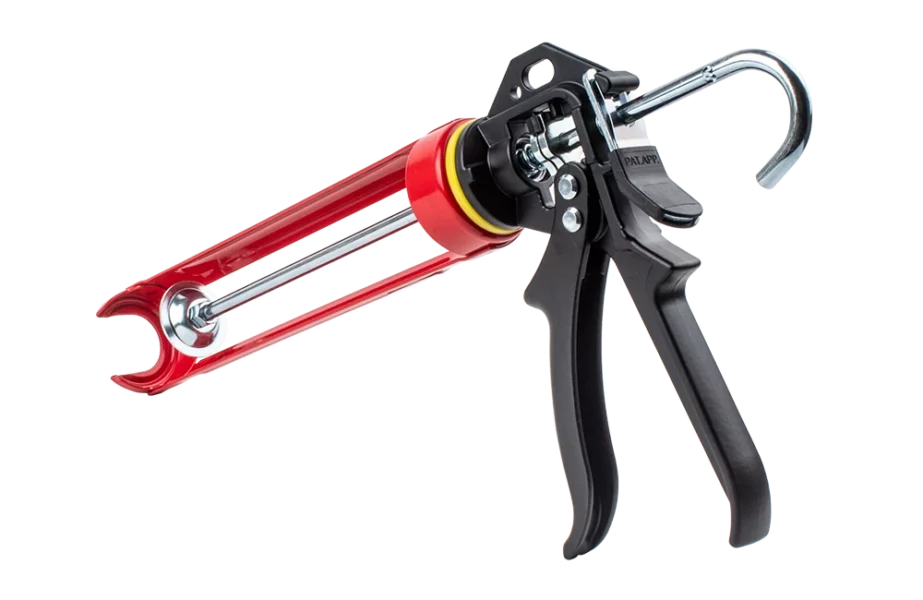 Weather Defender heavy-duty sealant gun with swivel-action barrel, designed for applying 290ml, 300ml, and 400ml adhesive and sealant cartridges during garage door threshold installation.