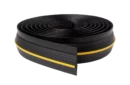 Coiled Weather Defender Trade Roll garage door bottom seal in black with a yellow center stripe.